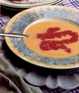 This chilled melon soup can be drizzled with a raspberry sauce.